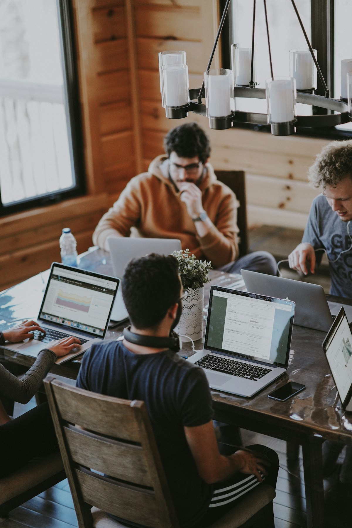 Freelancers working on laptops in a shared workspace